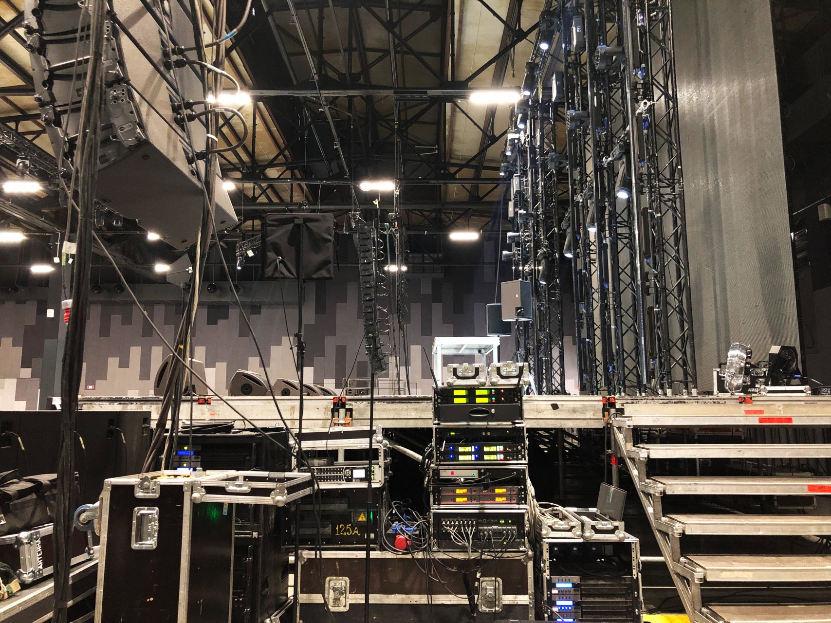 Backstage of a concert with rigging and equipment